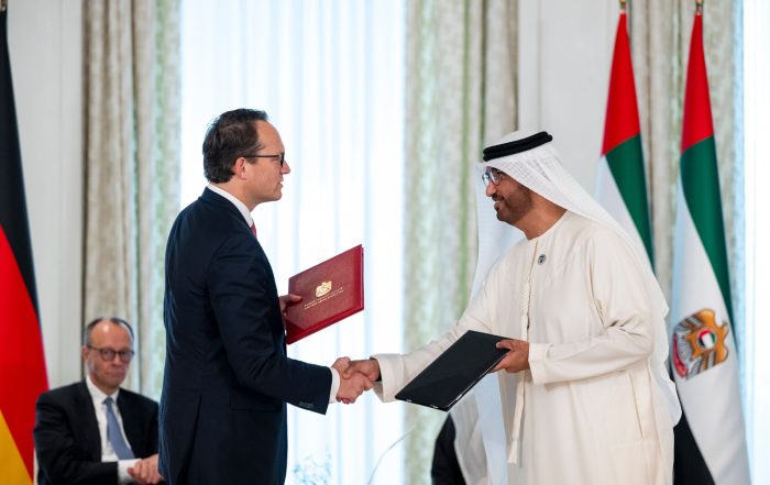 H.E. Dr Sultan bin Ahmed Al Jaber, UAE Minister of Industry and Advanced Technology Group CEO of ADNOC and Chairman of Masdar (R) and Dr. Markus Krebber, CEO of RWE (L), exchange a Memorandum of Understanding, at Al Shati Palace. ( Copyright: Abdulla Al Bedwawi / UAE Presidential Court )
